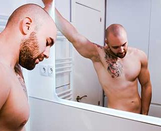 Hot AF bearded Spanish bro Axel Garcia has mesmerizing green eyes and a muscular 6'2" body. Enjoy as he showers and rubs soap all over his body before jerking off his uncut cock.