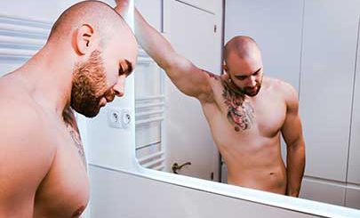 Hot AF bearded Spanish bro Axel Garcia has mesmerizing green eyes and a muscular 6'2" body. Enjoy as he showers and rubs soap all over his body before jerking off his uncut cock.