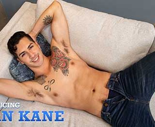 Kian Kane loves tattoos, is a total foot guy, and has great balls. He strokes his cock and plays with his ass for our camera before busting a big load.